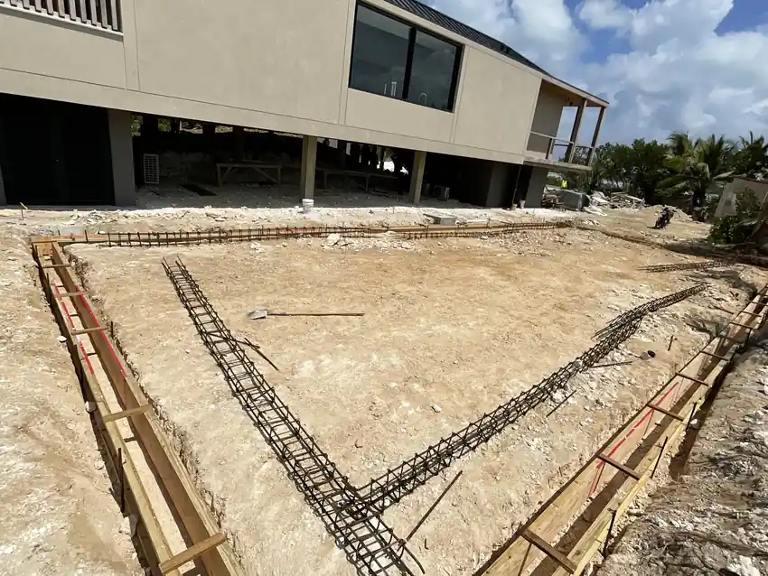 Steel reinforcement cages set into the perimeter footing trenches