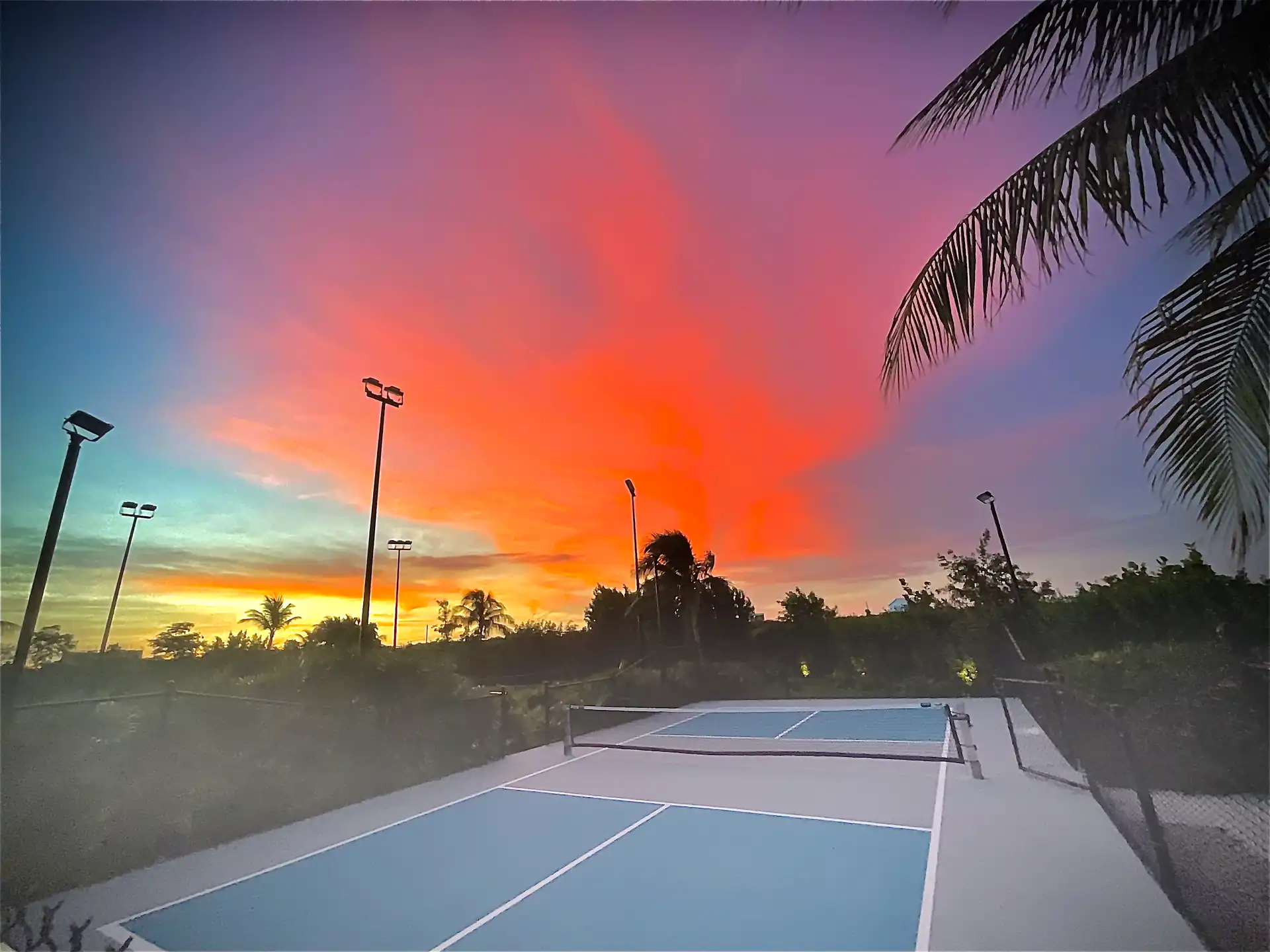 Finished court with net and regulation lines under the last light of the day in Providenciales